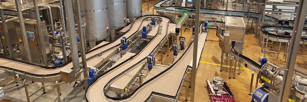 The interior of the brewery. The conveyor line for bottling of beer
